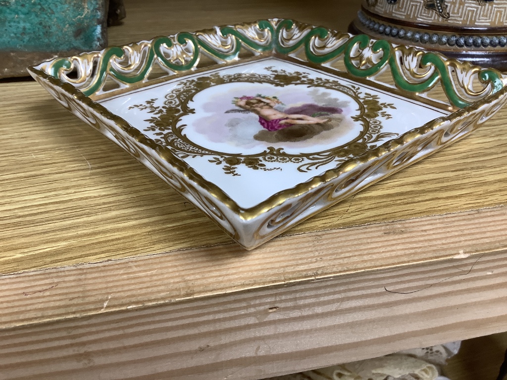 A Sevres square putti decorated dish, 15cm sq.